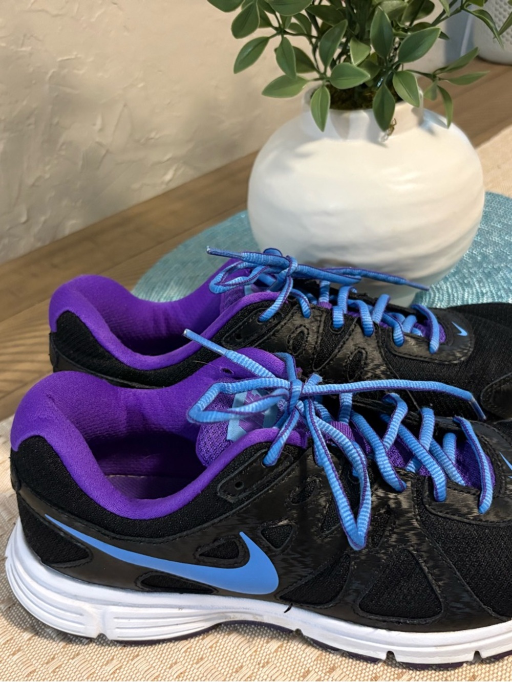 Nike Revolution 2 Women’s Black Trainers with Purple Lining and Blue Accents